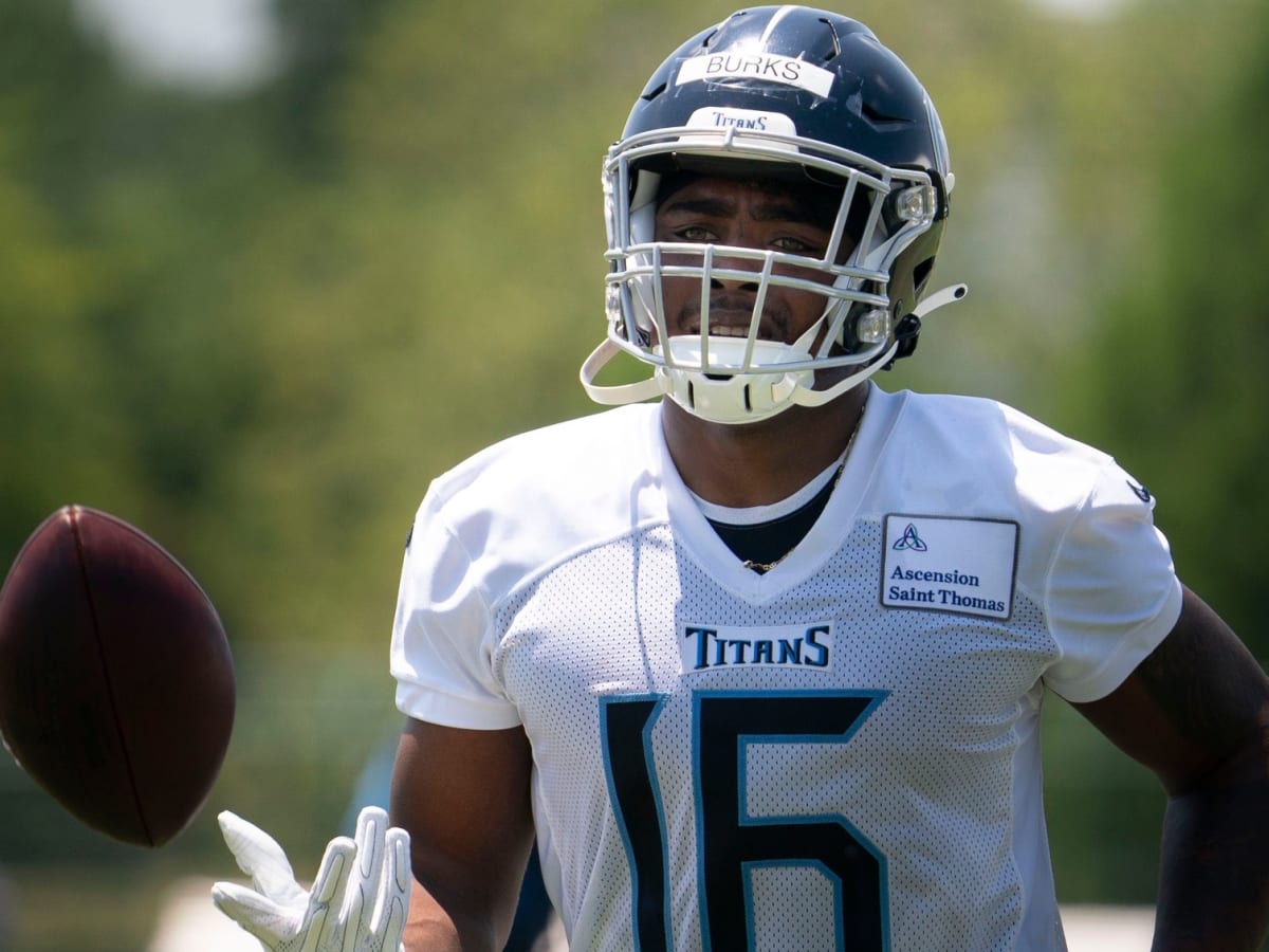 Titans' Treylon Burks takes brutal hit to facemask, somehow