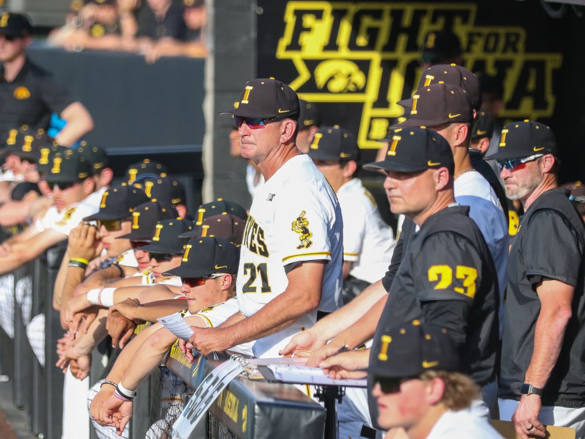 Iowa baseball coach Rick Heller reacts to the Hawkeyes' regional draw