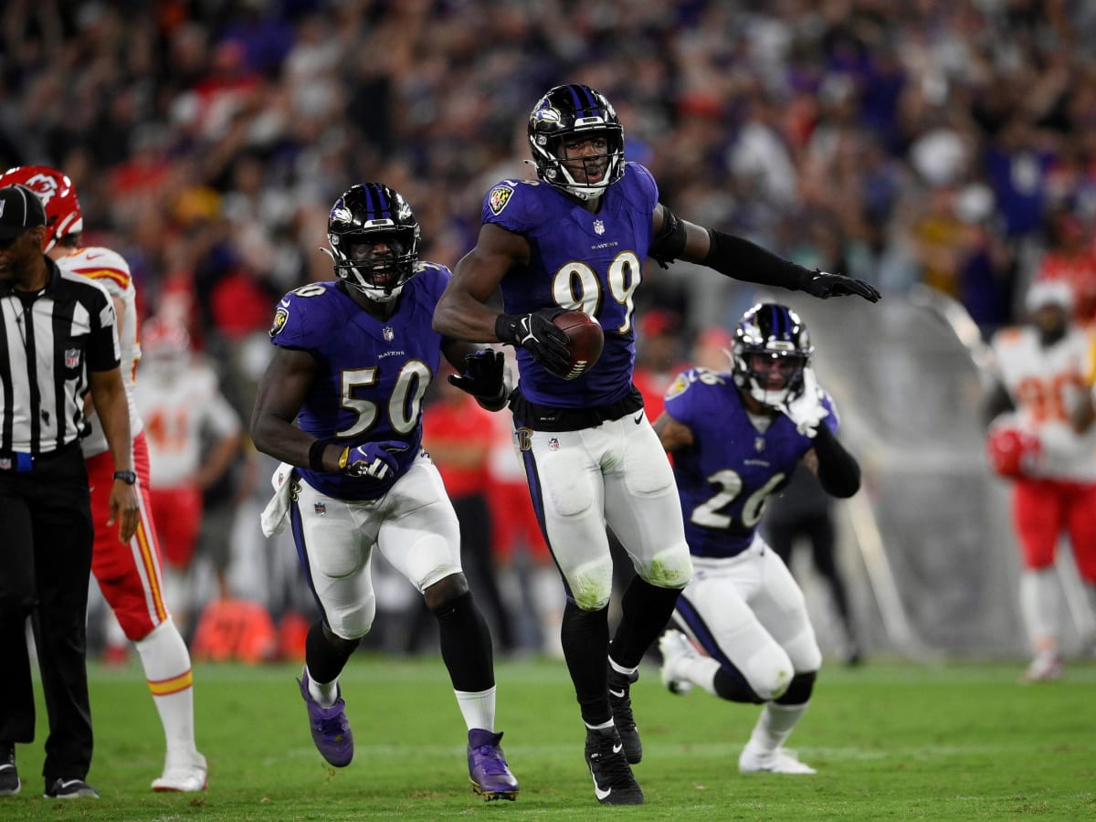 Baltimore Ravens linebacker Odafe Oweh (99) in action during the third  quarter an NFL preseason football game against the New Orleans Saints  Saturday, Aug. 14, 2021, in Baltimore. (AP Photo/Terrance Williams Stock