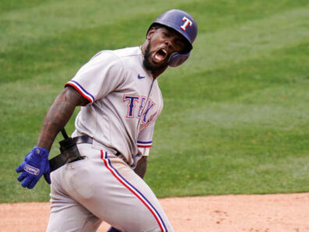 Adolis García homers in 10th, Texas Rangers come back to beat Minnesota  Twins 