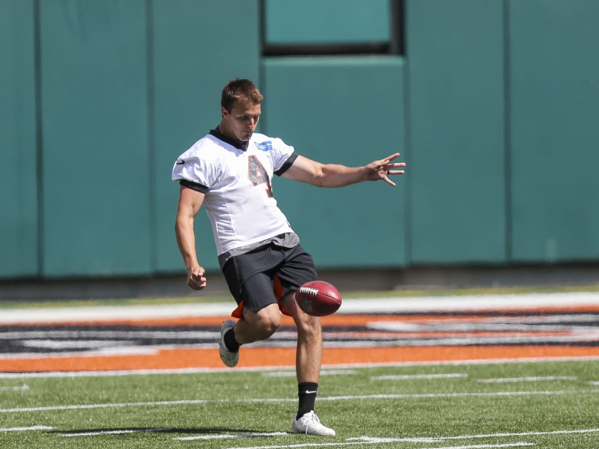 Bengals sign quarterback to practice squad and release punter Chrisman