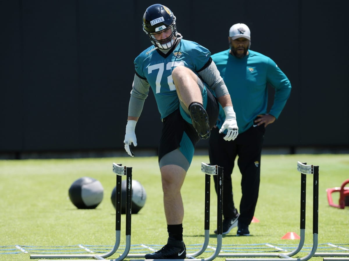 Walker Little of the Jacksonville Jaguars blocks during an NFL