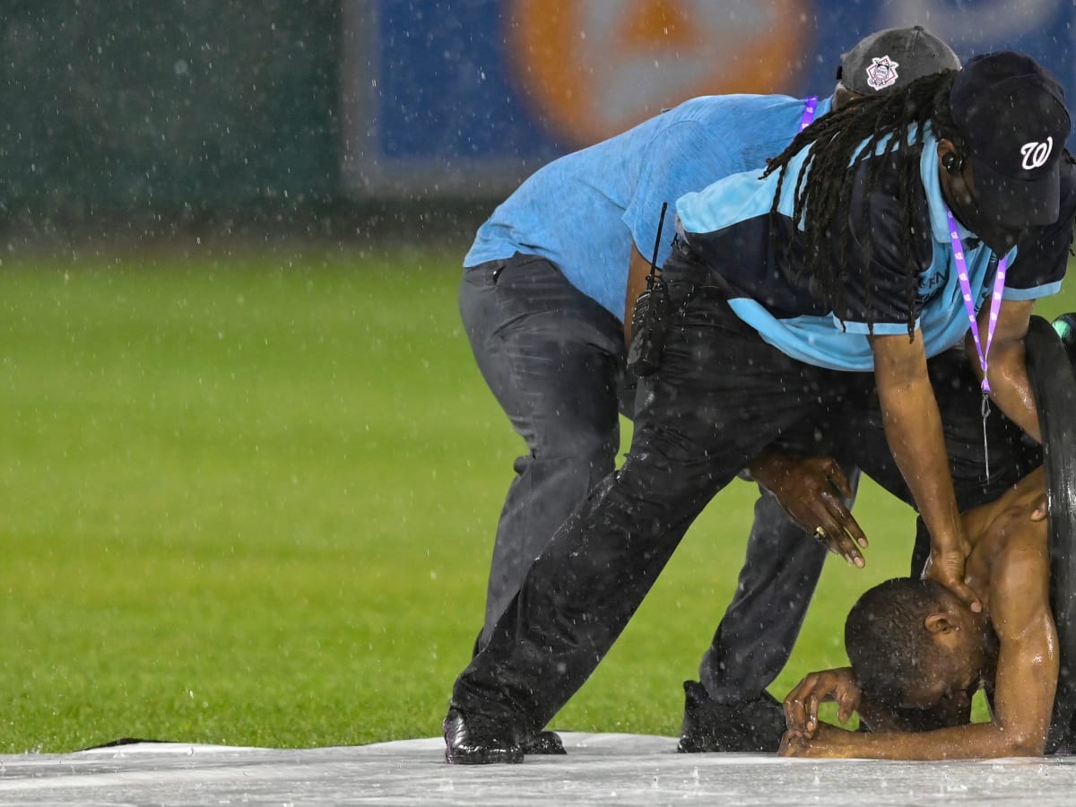 Nationals Park streaker, fully nude, hides in tarp roller (video) - Sports  Illustrated