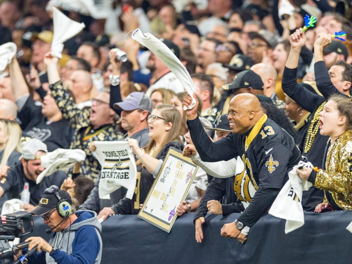 Saints fans celebrate a win inside the Superdome, around the city amid  COVID-19 pandemic