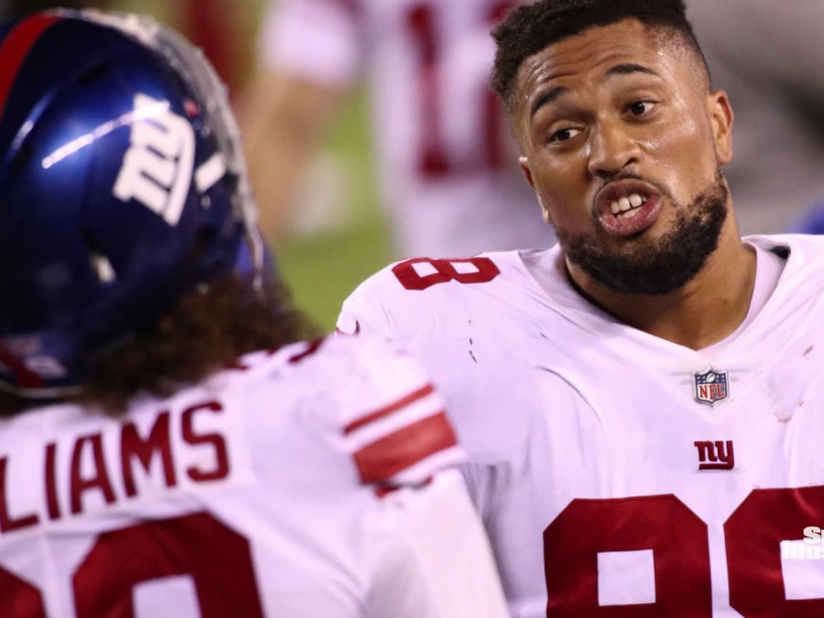 New York Giants defensive tackle Austin Johnson (98) walks on the field  during an NFL football game against the Philadelphia Eagles, Sunday, Nov. 28,  2021, in East Rutherford, N.J. The New York