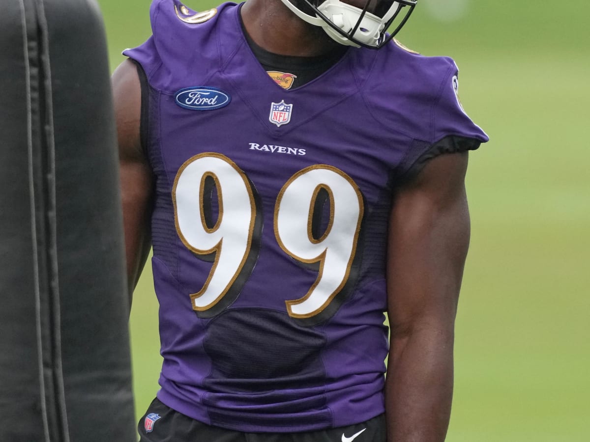 Baltimore Ravens linebacker Odafe Oweh (99) in action during the third  quarter an NFL preseason football game against the New Orleans Saints  Saturday, Aug. 14, 2021, in Baltimore. (AP Photo/Terrance Williams Stock