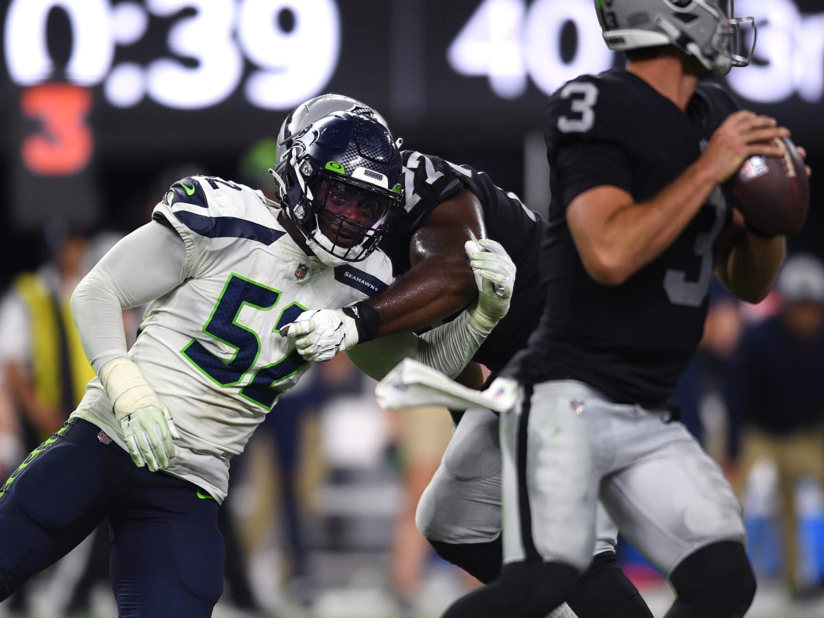 Seattle Seahawks defensive end Darrell Taylor (52) looks into the backfield  during an NFL football game against the San Francisco 49ers, Sunday, Sept.  18, 2022, in Santa Clara, Calif. (AP Photo/Scot Tucker