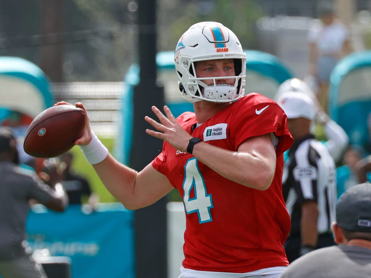 Miami Dolphins quarterback Reid Sinnett (4) watches a video replay on the  board during an NFL football game against the Cincinnati Bengals, Sunday,  Aug. 29, 2021, in Cincinnati. (AP Photo/Zach Bolinger Stock