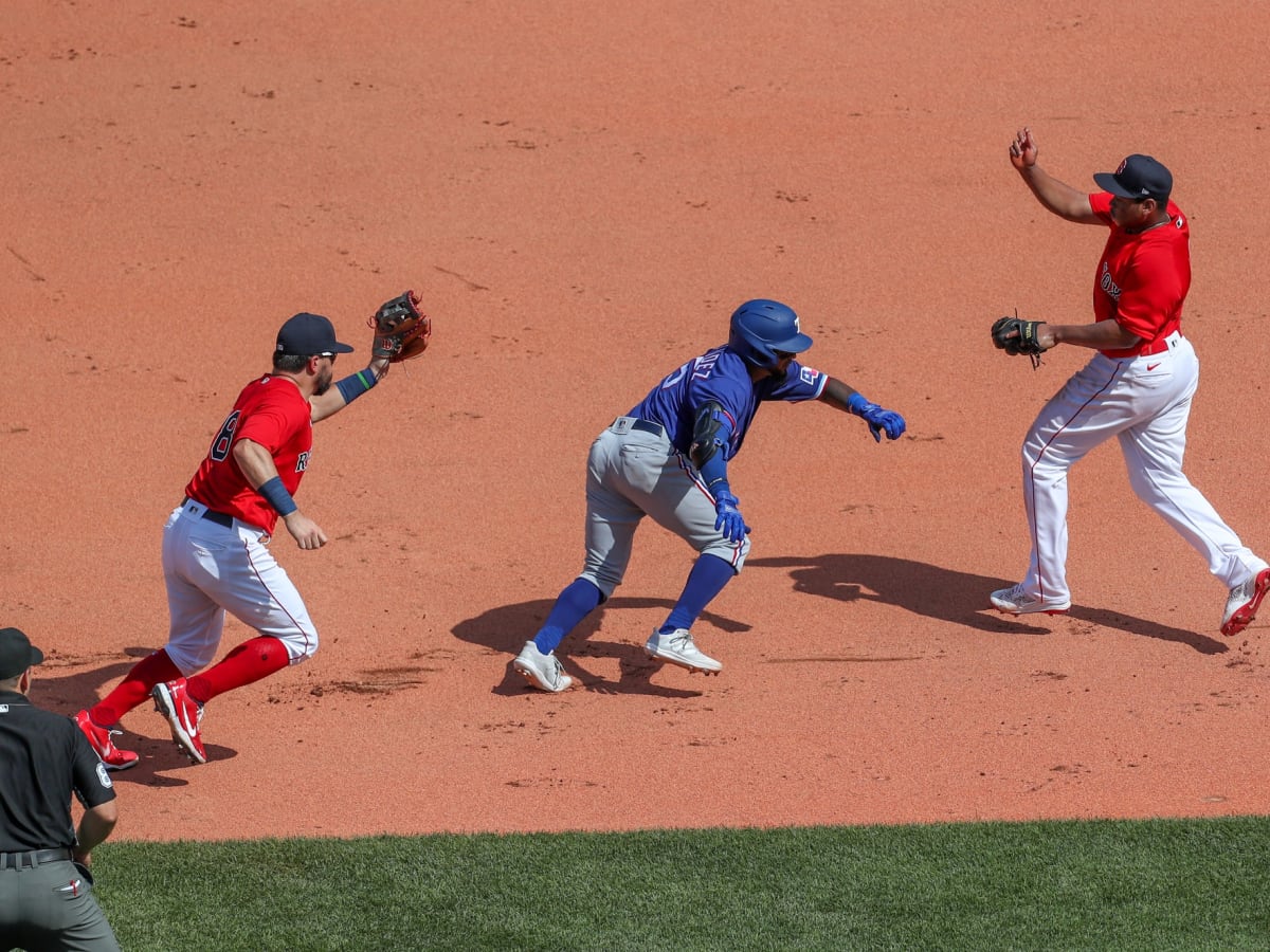 Boston Red Sox' Chad De La Guerra is tagged out at second base by