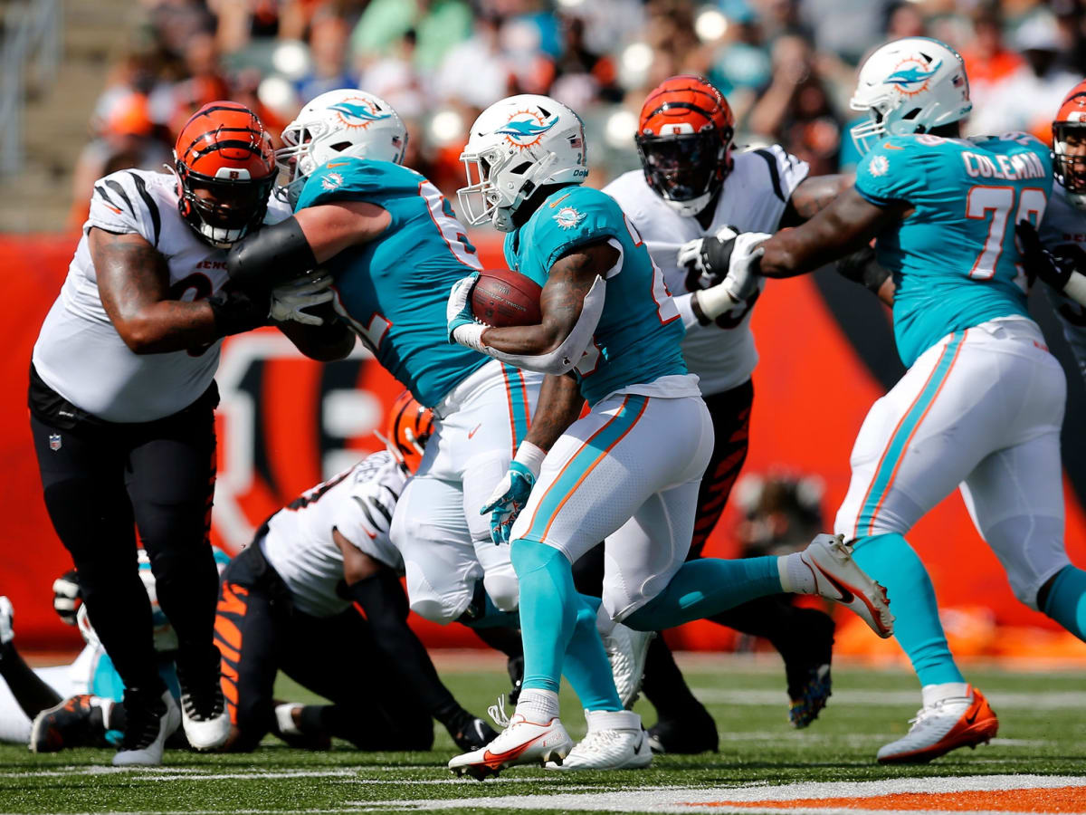 Miami Dolphins quarterback Reid Sinnett (4) watches a video replay on the  board during an NFL football game against the Cincinnati Bengals, Sunday,  Aug. 29, 2021, in Cincinnati. (AP Photo/Zach Bolinger Stock