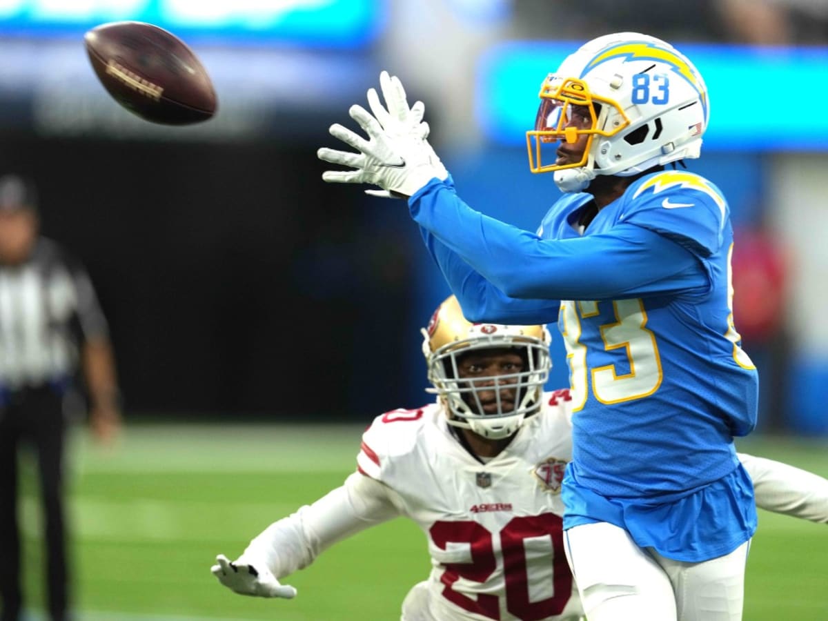 Los Angeles Chargers wide receiver Tyron Johnson (83) is defended