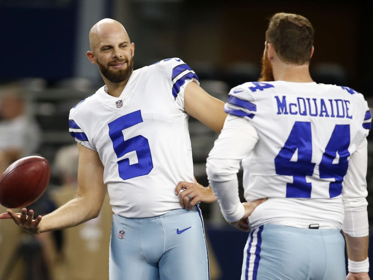 Dallas Cowboys punter Bryan Anger kicks a punt in the second half of an NFL  football game against the Washington Commanders, Sunday, Jan. 8, 2023, in  Landover, Md. (AP Photo/Patrick Semansky Stock