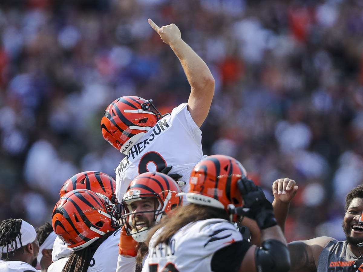 Joe Burrow kisses Evan McPherson to celebrate game-winning field goal