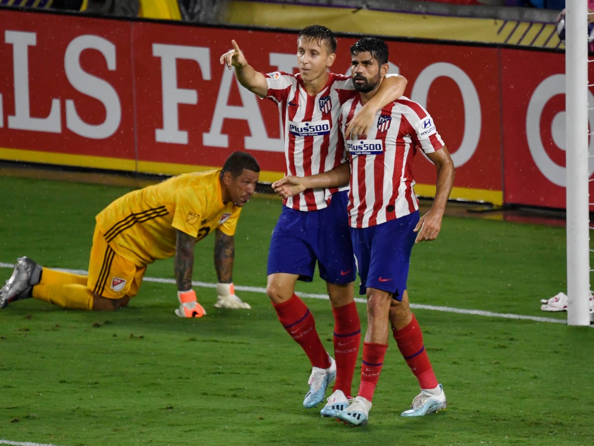 Atletico beats Feyenoord 3-1 to reach Champions League knockout stage