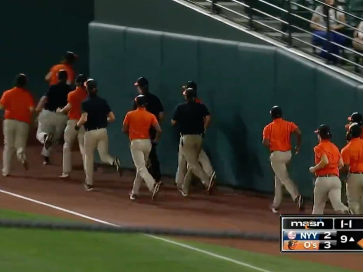 SEE IT: Umpire tosses Orioles' grounds crew