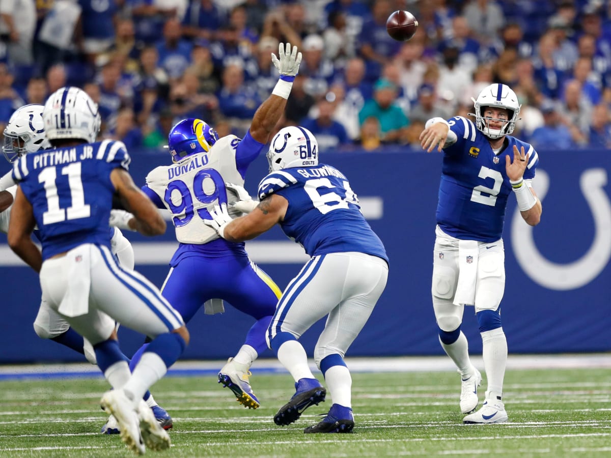 Indianapolis Colts guard Mark Glowinski (64) walks back to the huddle  during an NFL football game