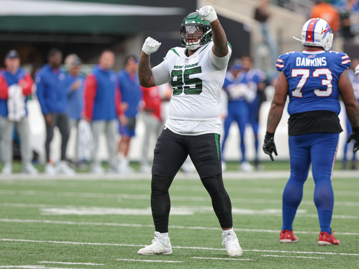 New York Jets linebacker Quincy Williams (56) reacts after breaking up a  pass in the end zone against the Buffalo Bills during the second quarter of  an NFL football game, Monday, Sept.