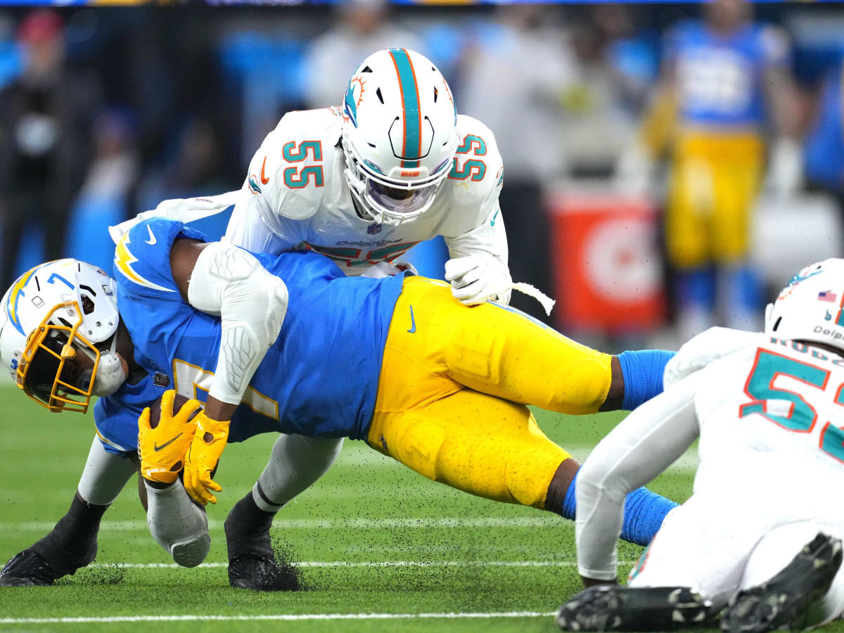 Miami Dolphins linebacker Jerome Baker (55) looks to defend during