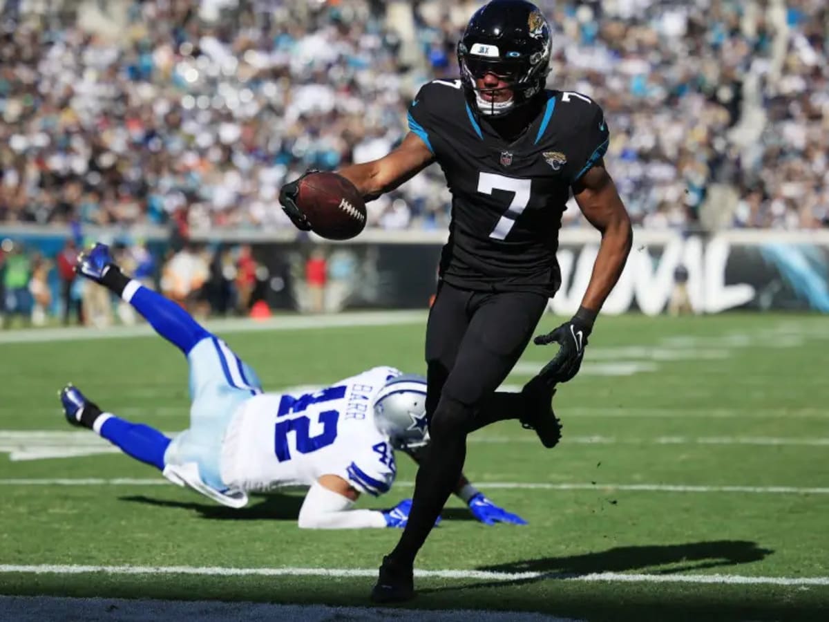 December 18, 2022: Jacksonville Jaguars quarterback TREVOR LAWRENCE (16)  gets sacked by Dallas Cowboys linebacker MICAH PARSONS (11) during the  Jacksonville Jaguars vs Dallas Cowboys NFL game at TIAA Bank Field Stadium