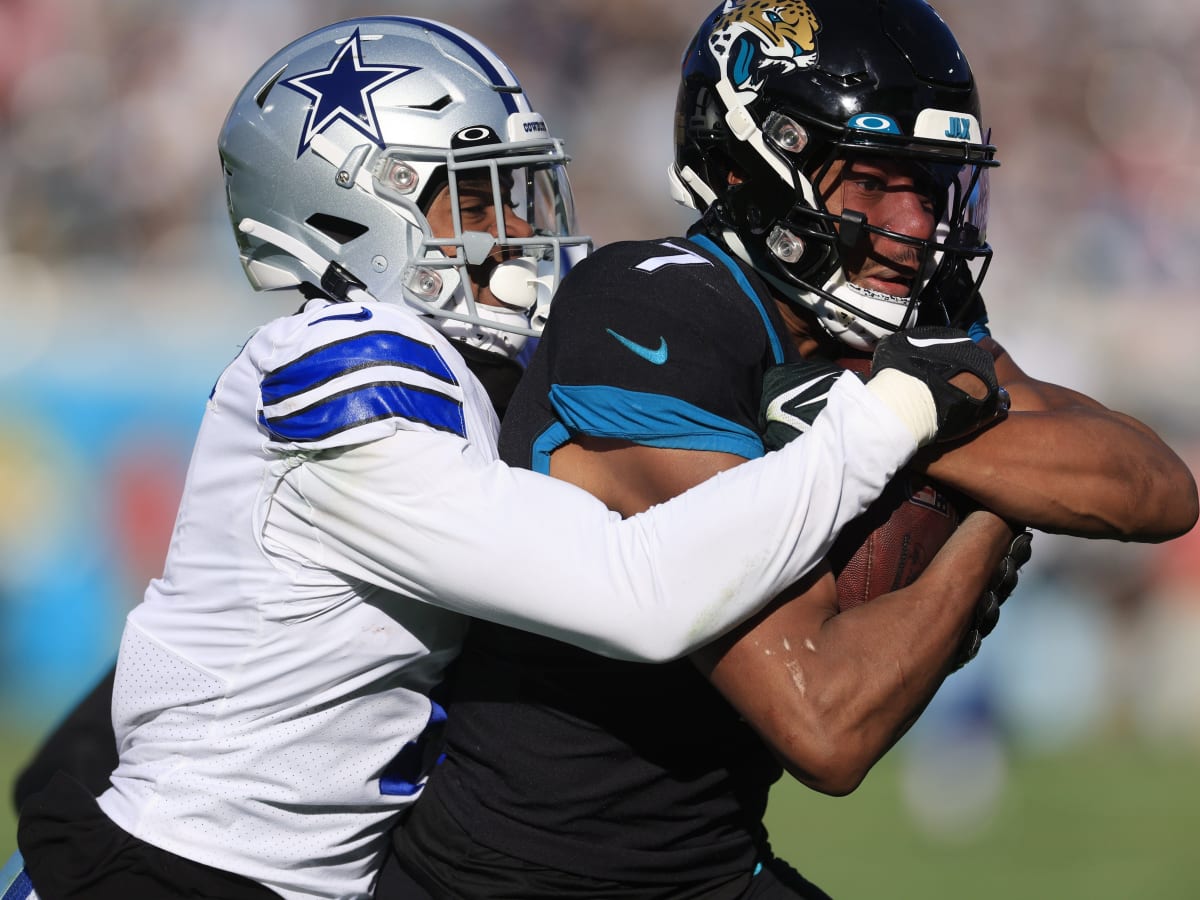 ARLINGTON, TX - DECEMBER 11: Dallas Cowboys DB Kelvin Joseph breaks up a  pass during the game featuring the Houston Texans and the Dallas Cowboys on December  11, 2022 at AT&T Stadium