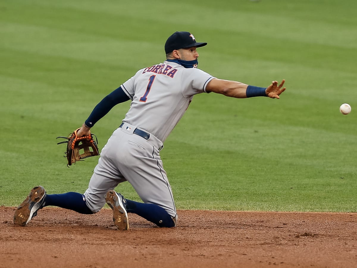 August 10, 2018: Houston Astros shortstop Carlos Correa (1) throws to first  during a Major League Baseball game between the Houston Astros and the  Seattle Mariners on 1970s night at Minute Maid