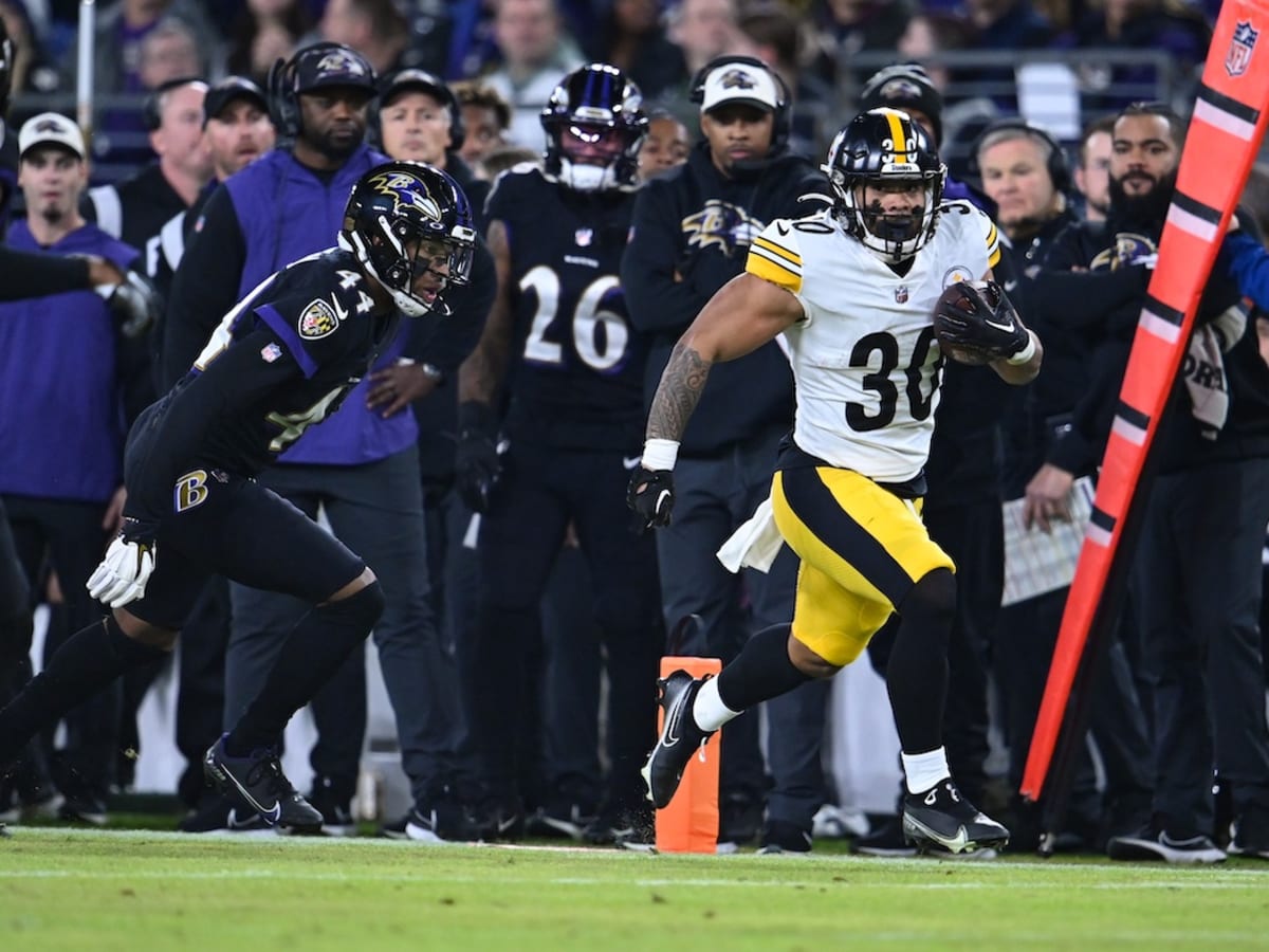 The Pittsburgh Steelers flag corps leads the team on to the field before an  NFL football game against the Baltimore Ravens, Sunday, Dec. 10, 2017, in  Pittsburgh. (AP Photo/Keith Srakocic Stock Photo 