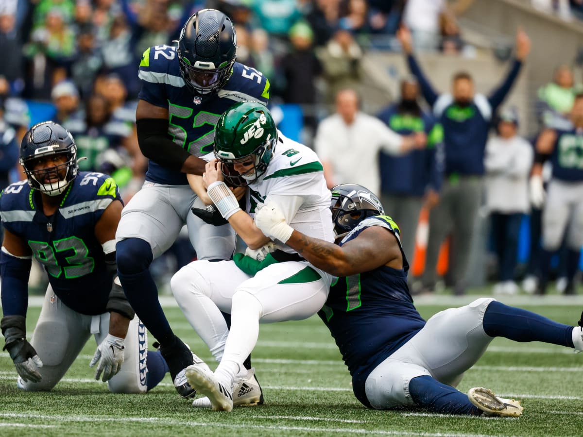 Seattle Seahawks defensive end Shelby Harris (93) runs onto the field  before an NFL football game against the New York Giants, Sunday, Oct. 30,  2022, in Seattle, WA. The Seahawks defeated the