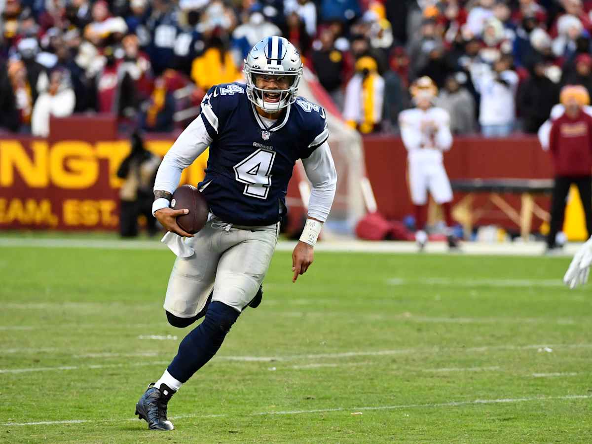 January 8, 2023 : Washington Commanders linebacker Khaleke Hudson (47)  applies pressure to Dallas Cowboys quarterback Dak Prescott (4) during the  game between the Dallas Cowboys and the Washington Commanders in Landover