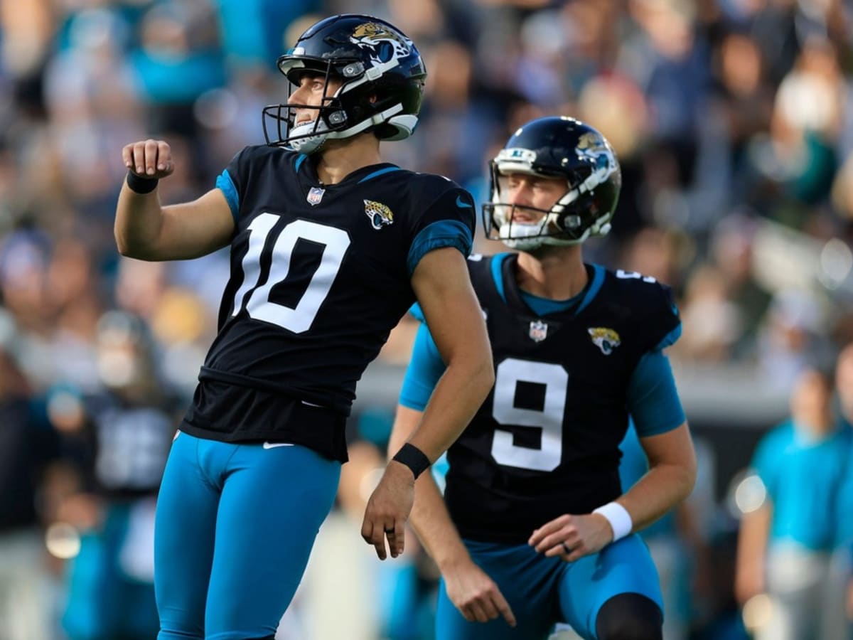 Jacksonville Jaguars place kicker Riley Patterson, top right, and