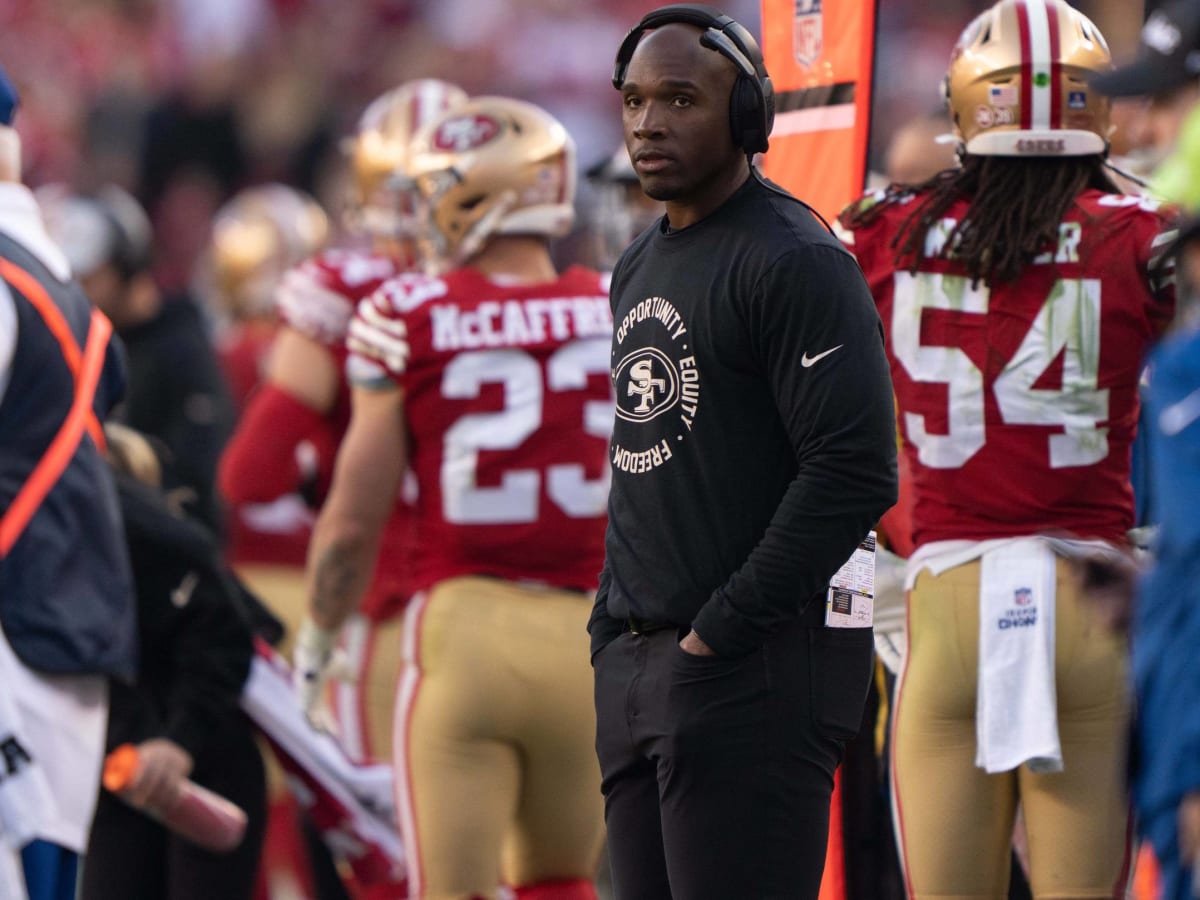 San Francisco 49ers defensive coordinator DeMeco Ryans looks up at a replay  during an NFL football game against the Minnesota Vikings, Sunday, Nov. 28,  2021, in Santa Clara, Calif. (AP Photo/Scot Tucker