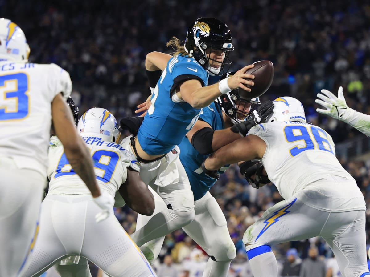 Trevor Lawrence overcomes four early picks, Jaguars eliminate pitiful  Chargers