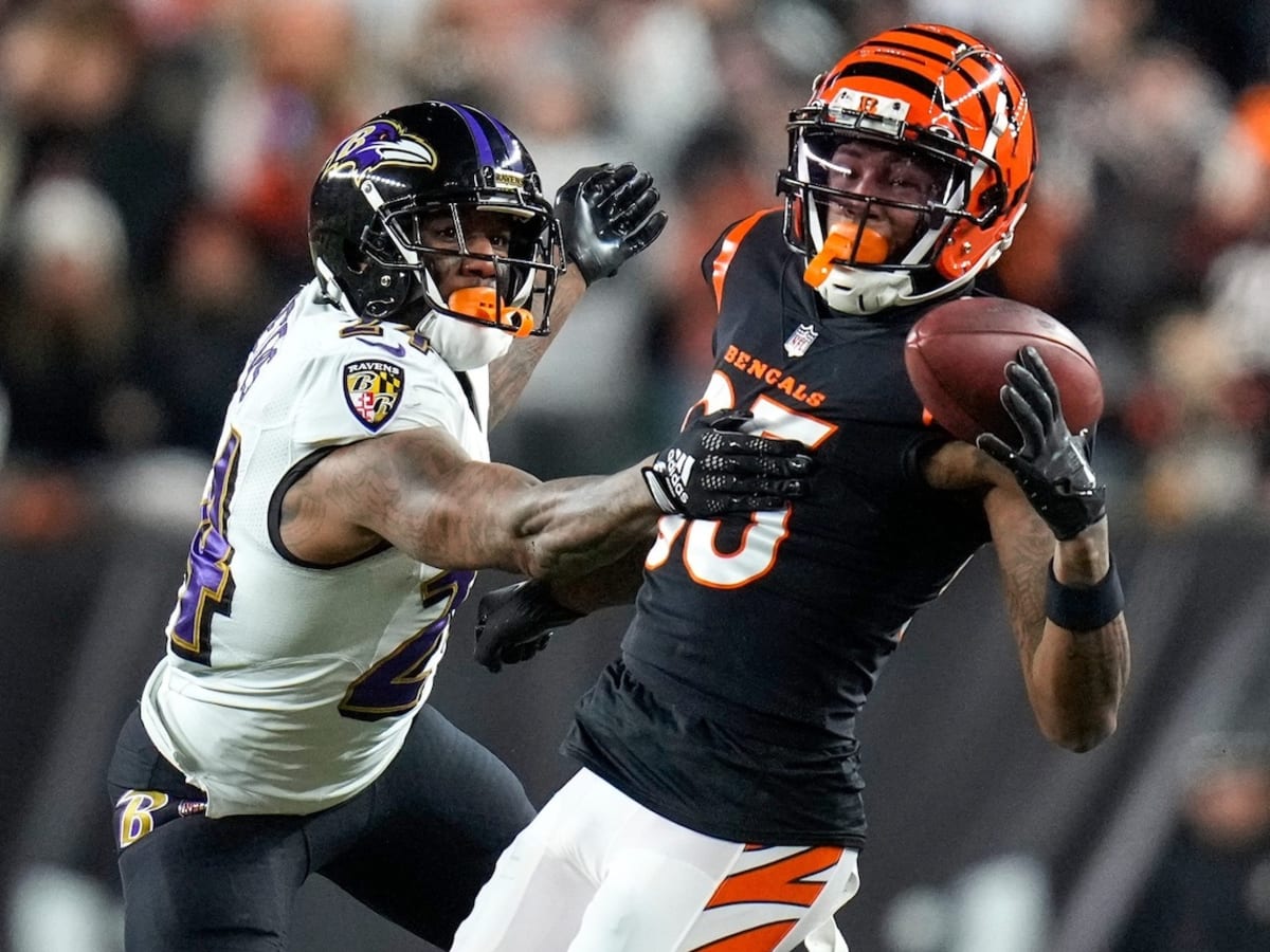 Jayron Kearse of the Dallas Cowboys tackles Trevor Lawrence of the