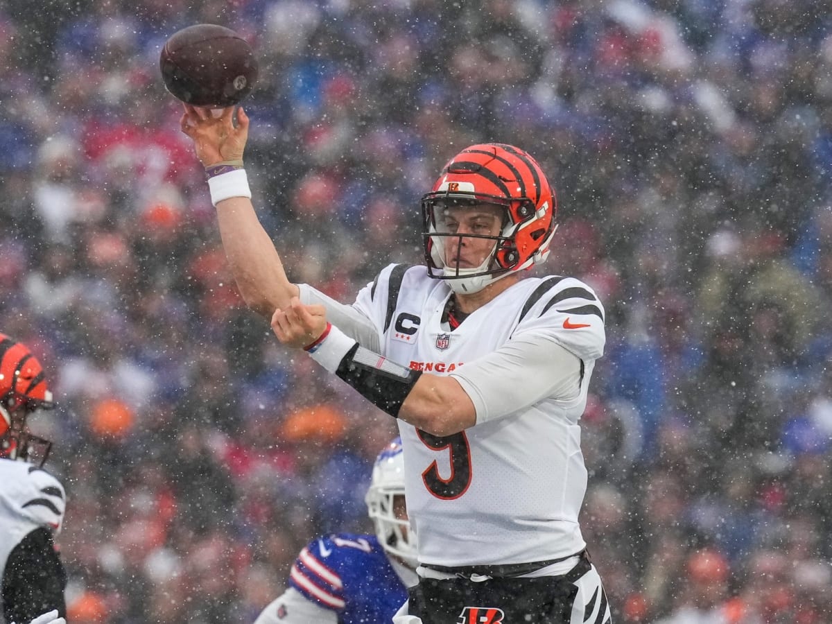 NFL playoffs: Joe Burrow, Bengals plow past Bills in snowy AFC