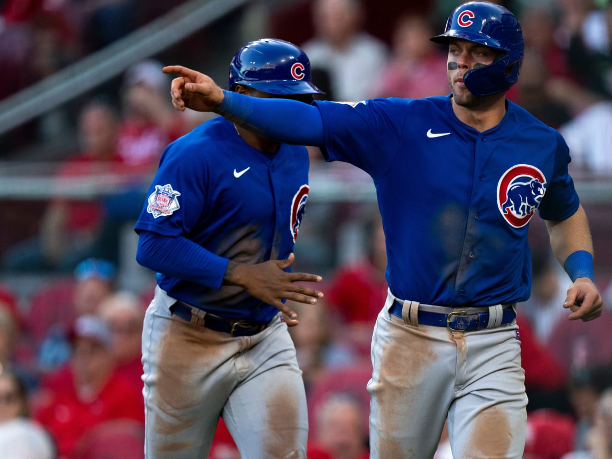 TORONTO, ON - AUGUST 12: Chicago Cubs second baseman Nico Hoerner (2)  throws the ball to first base for the out during the MLB regular season  game between the Chicago Cubs and