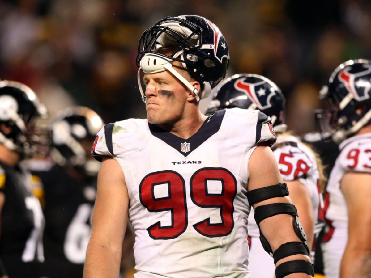 Houston Texans defensive end J.J. Watt (99) talks with his brothers  Pittsburgh Steelers outside linebacker T.J. Watt (90) and fullback Derek  Watt (44) following an NFL football game, Sunday, Sept. 27, 2020