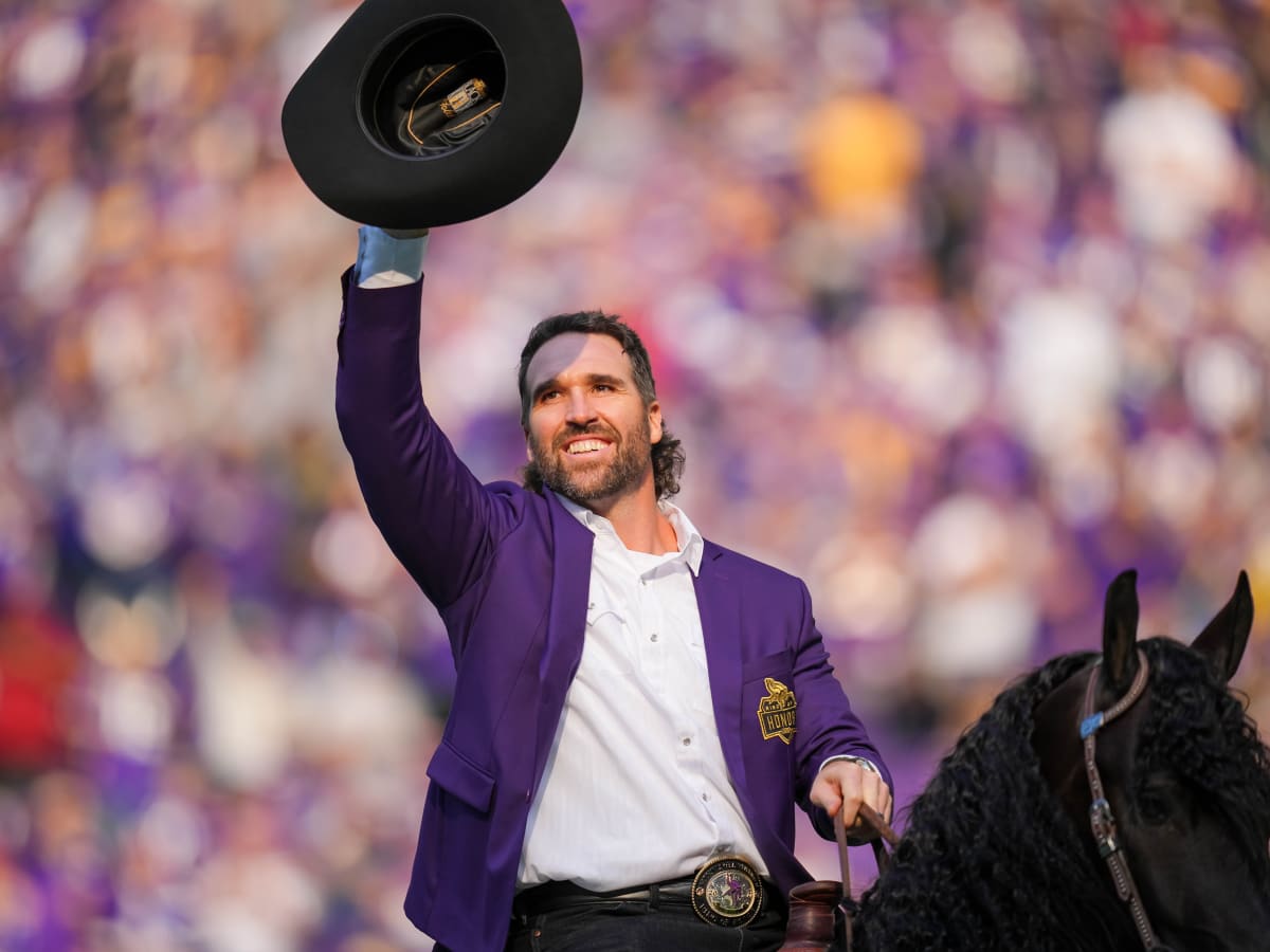 Former Minnesota Vikings defensive end Jared Allen sounds the Gjallarhorn  before an NFL football game between the Minnesota Vikings and the Arizona  Cardinals, Sunday, Oct. 30, 2022, in Minneapolis. (AP Photo/Bruce Kluckhohn