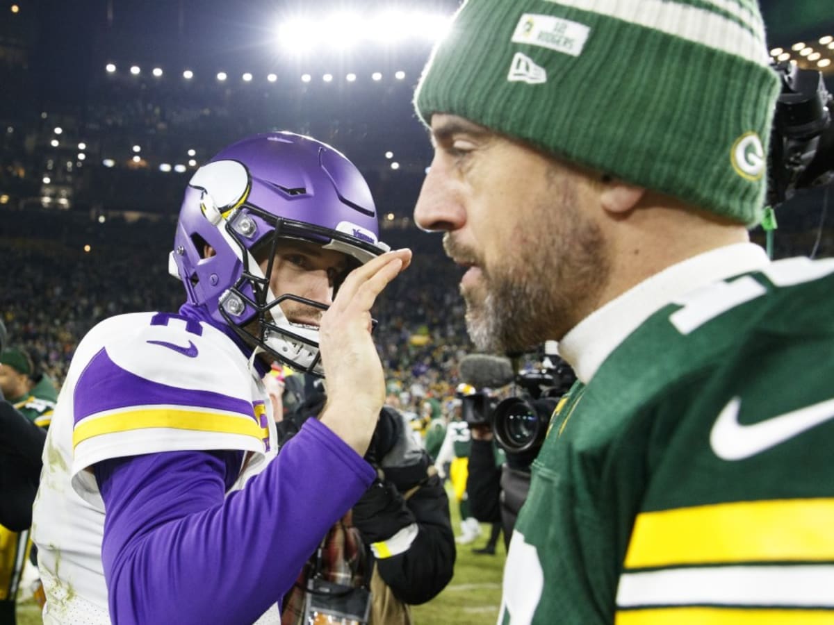 Rodgers, Packers roll past Vikings in largely empty stadium