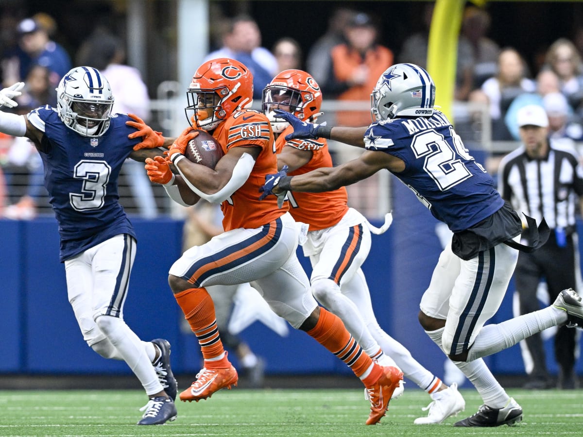 December 24, 2022 - Chicago Bears running back Khalil Herbert (24) fends  off a tackle attempt during