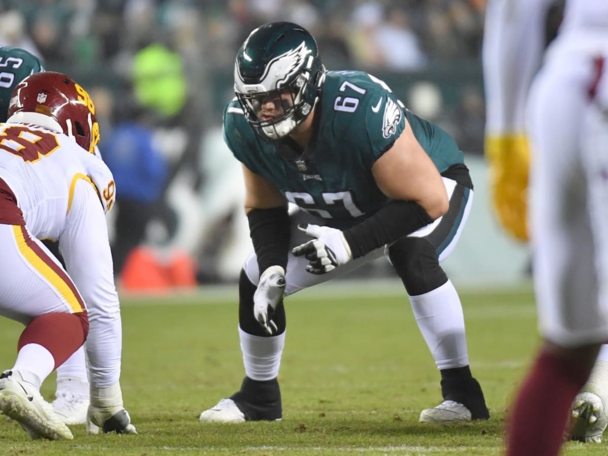 New York Jets guard Nate Herbig (65) walks to the line of