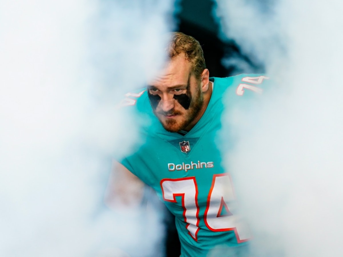 Miami Dolphins offensive tackle Liam Eichenberg (74) walks on the field  during the second half of an NFL football game against the New York Jets,  Sunday, Jan. 8, 2023, in Miami Gardens