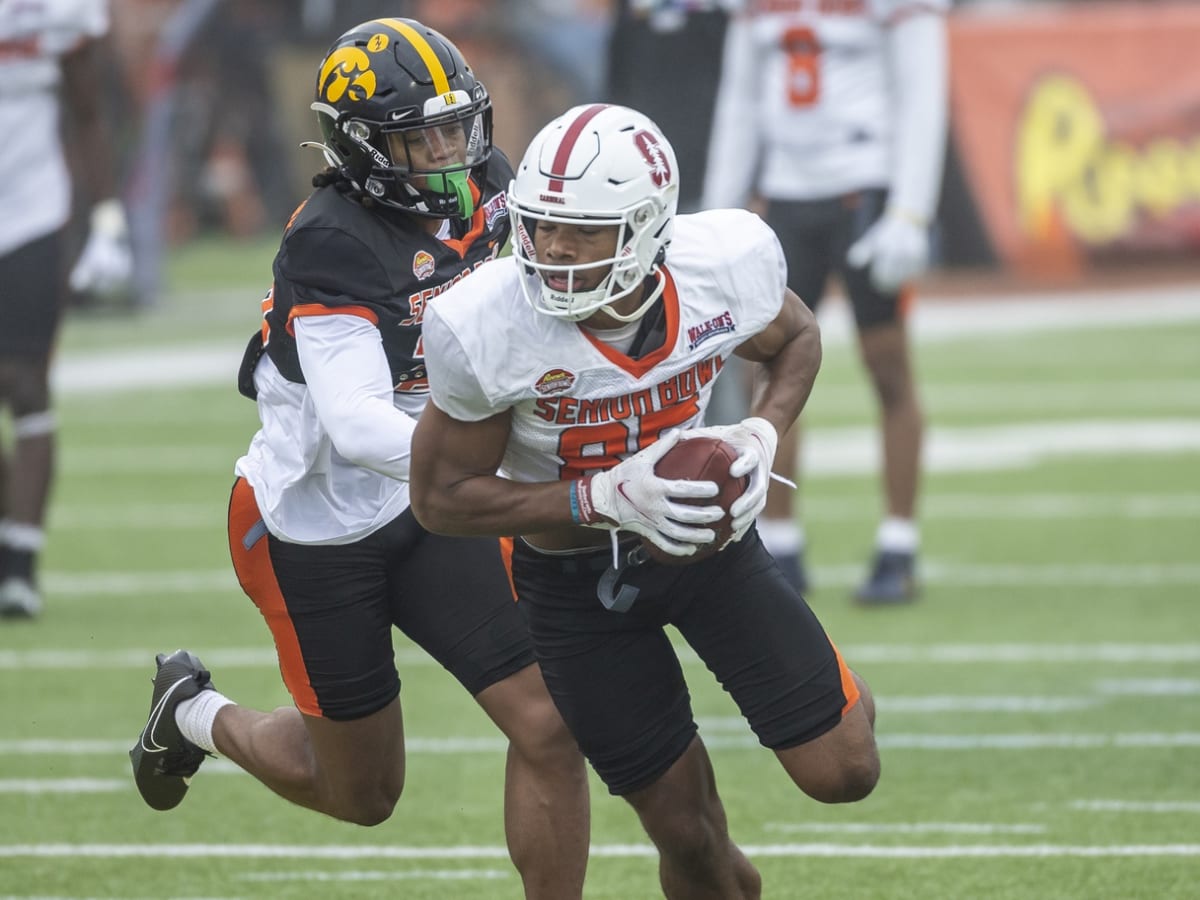 Miami Dolphins tight end Elijah Higgins prepares to speak to the