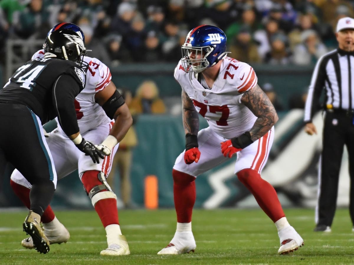 New York Giants guard Jack Anderson (77) walks off the field after an NFL  football game against the Houston Texans on Sunday, Nov. 13, 2022, in East  Rutherford, N.J. (AP Photo/Adam Hunger