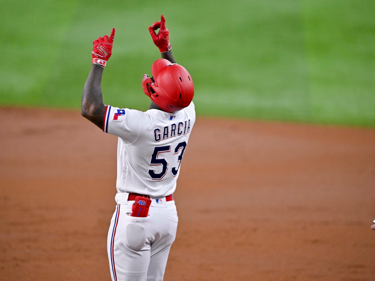 Rangers slugger Adolis García, leading the AL in RBIs, exits game