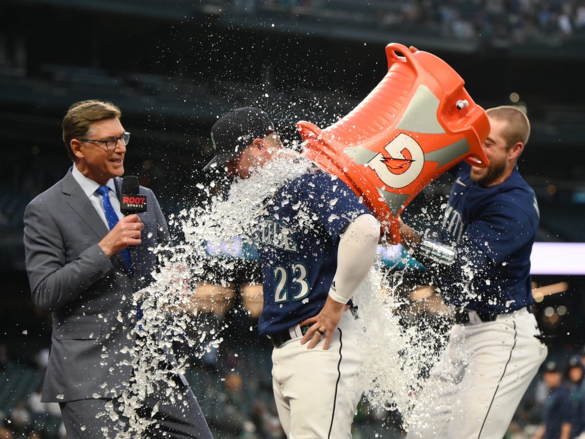 Seattle Mariners' J.P. Crawford holds a trident after hitting a solo home  run against the Oakland Athletics during the ninth inning of a baseball  game Tuesday, Sept. 19, 2023, in Oakland, Calif. (