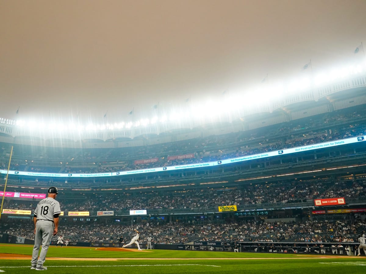 See pictures from a smoky night at Wrigley Field on Tuesday