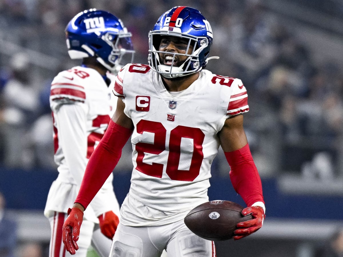 New York Giants cornerback Julian Love (37) tackles New England