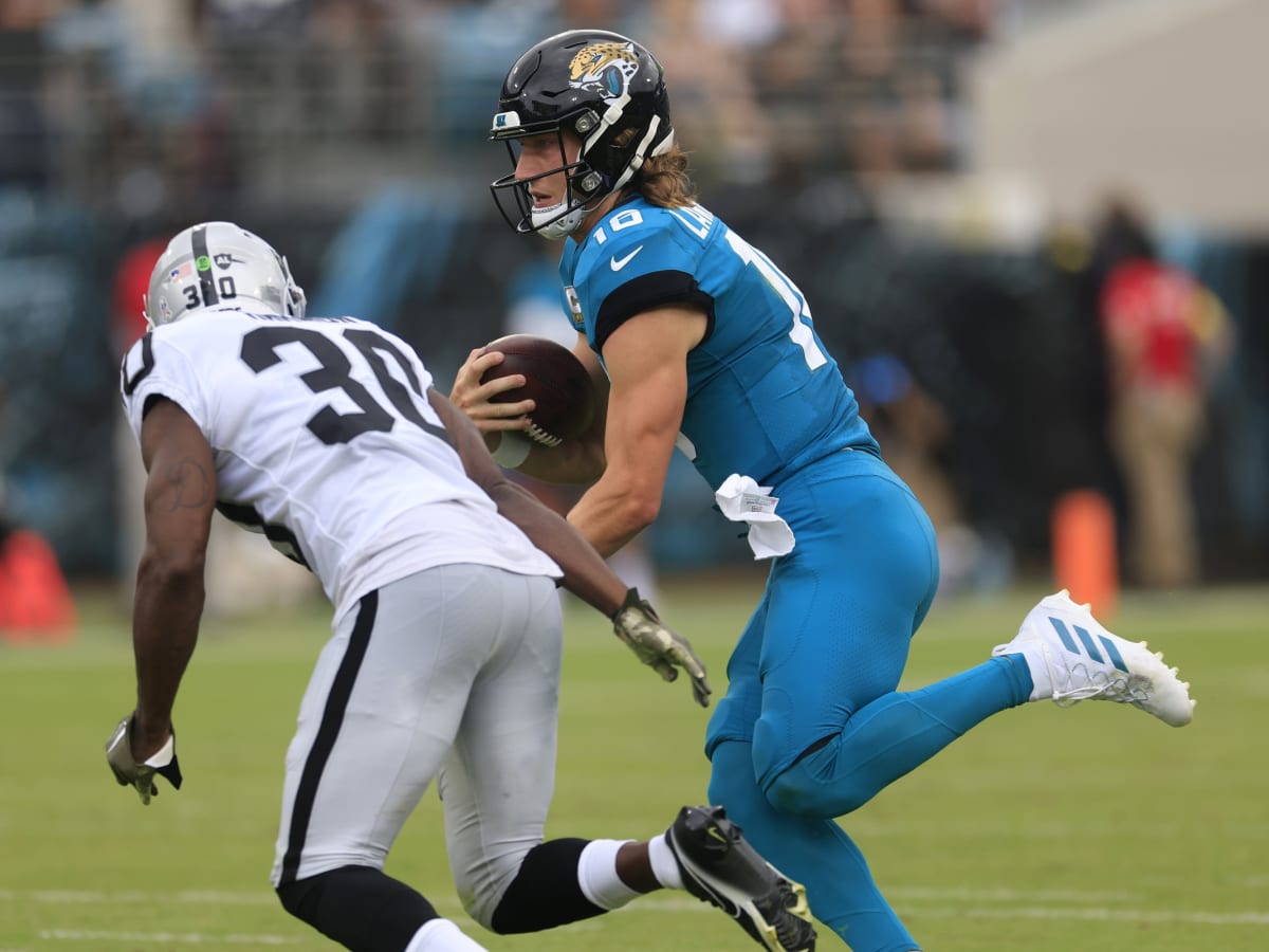 Jaguars QB Trevor Lawrence shows off cleats vs. Rams designed by Long  Branch students