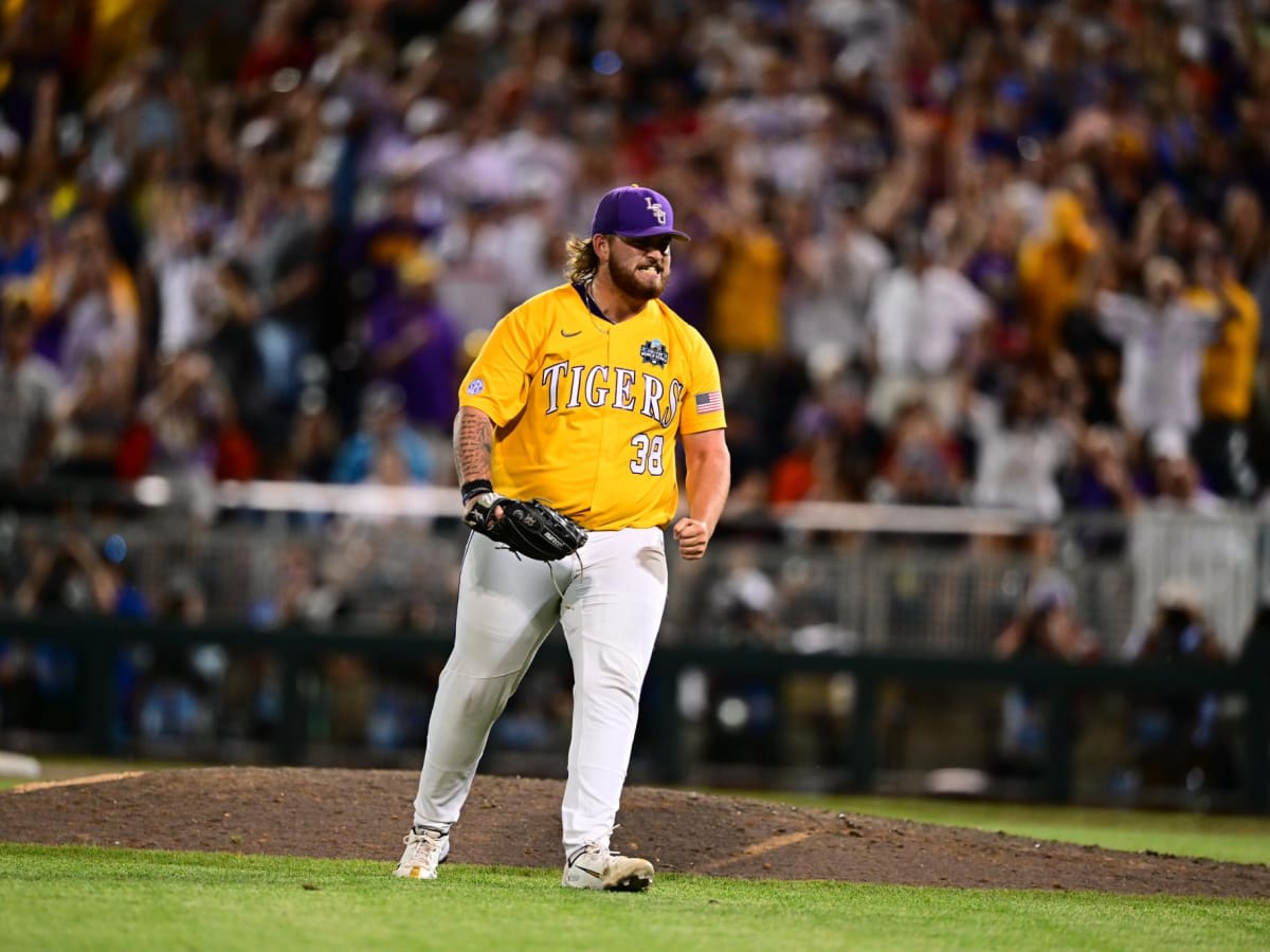 The Florida dugout reacts after Jonathan India hit a two-run RBI double in  the fourth inning of Game 1 of the NCAA College World Series baseball  finals against LSU in Omaha, Neb.