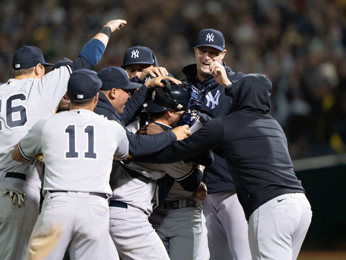 A's hold on to beat Yankees for first time this year