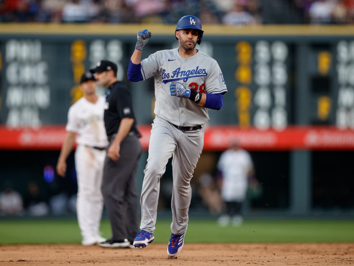 LOS ANGELES, CA - MARCH 31: Los Angeles Dodgers left fielder J.D. Martinez  (28) holds his bat in the dugout during a regular season game between the  Arizona Diamondbacks and Los Angeles